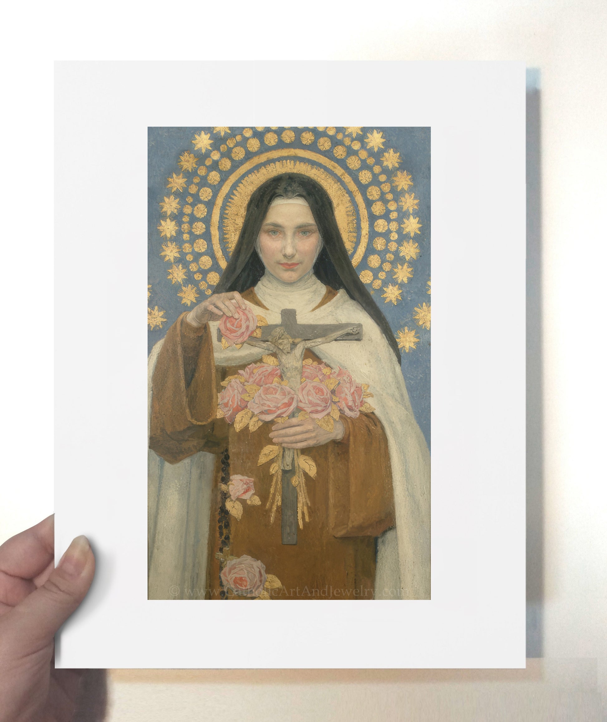 a painting of a woman holding a cross
