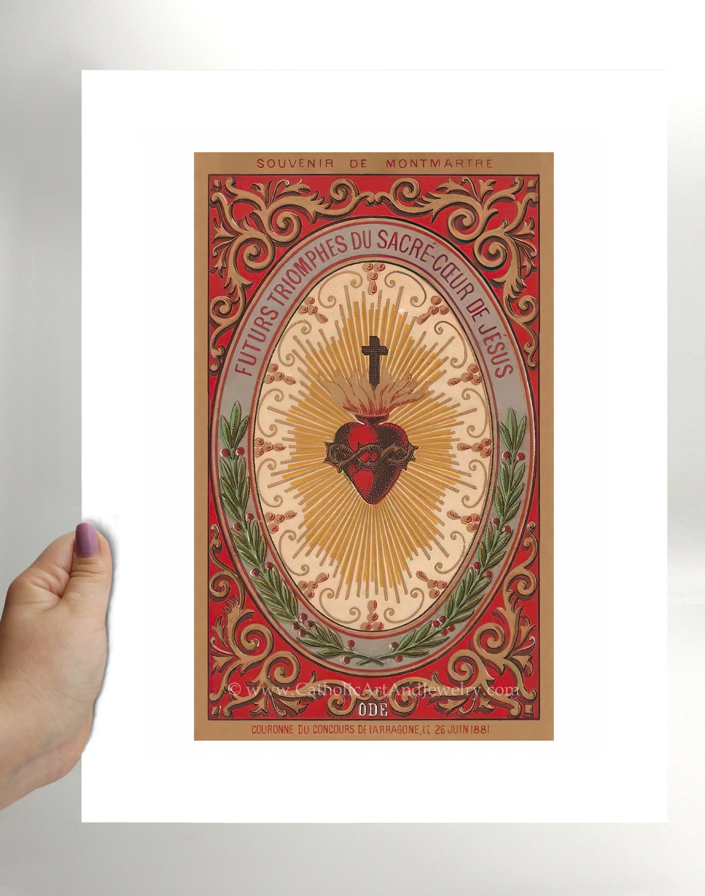 a hand holding a card with a heart on it