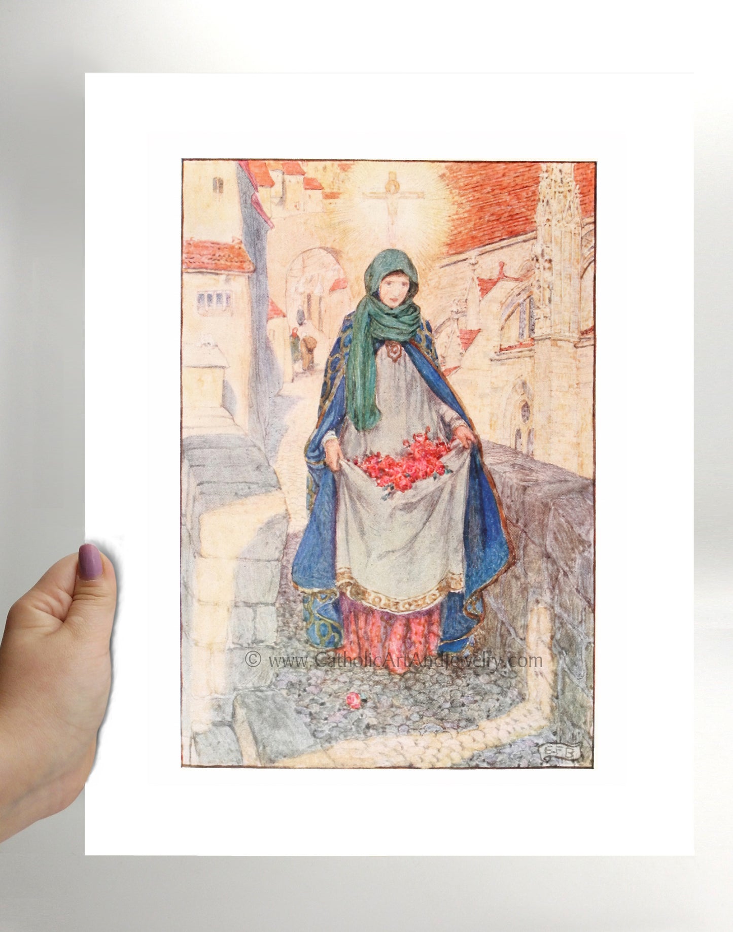 a person holding up a picture of a woman