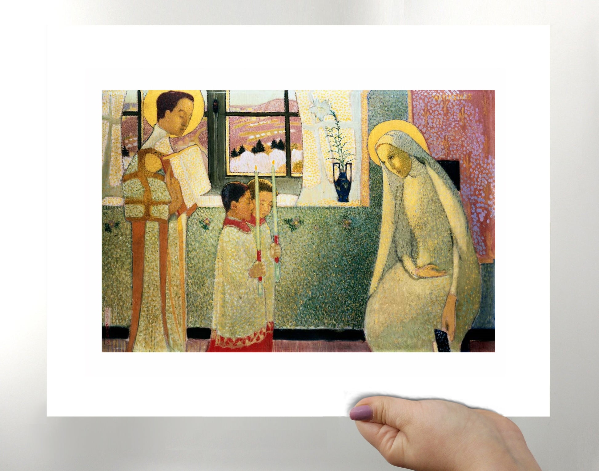 a woman holding up a picture of a woman and child