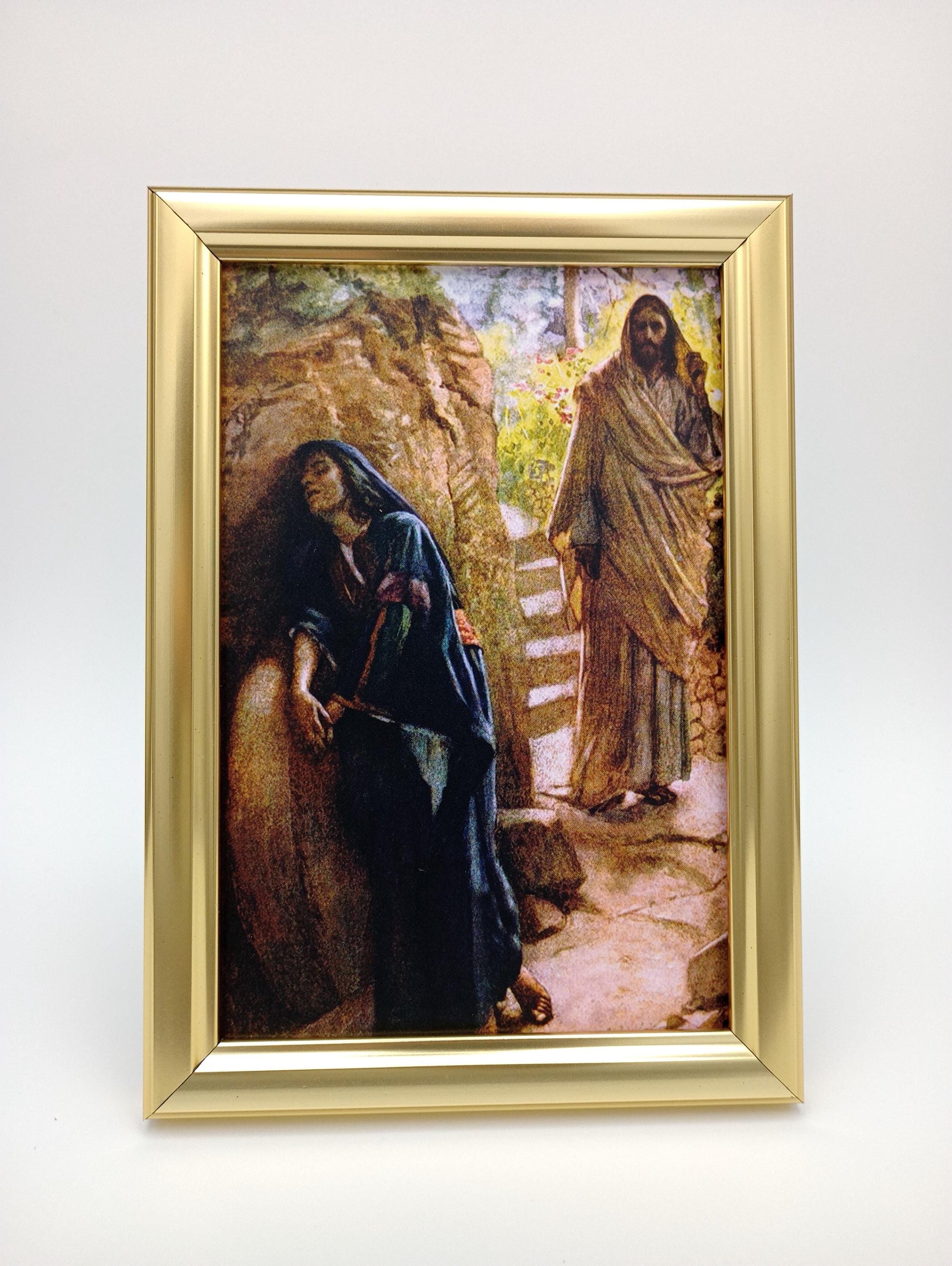 a painting hanging on a wall with a gold frame