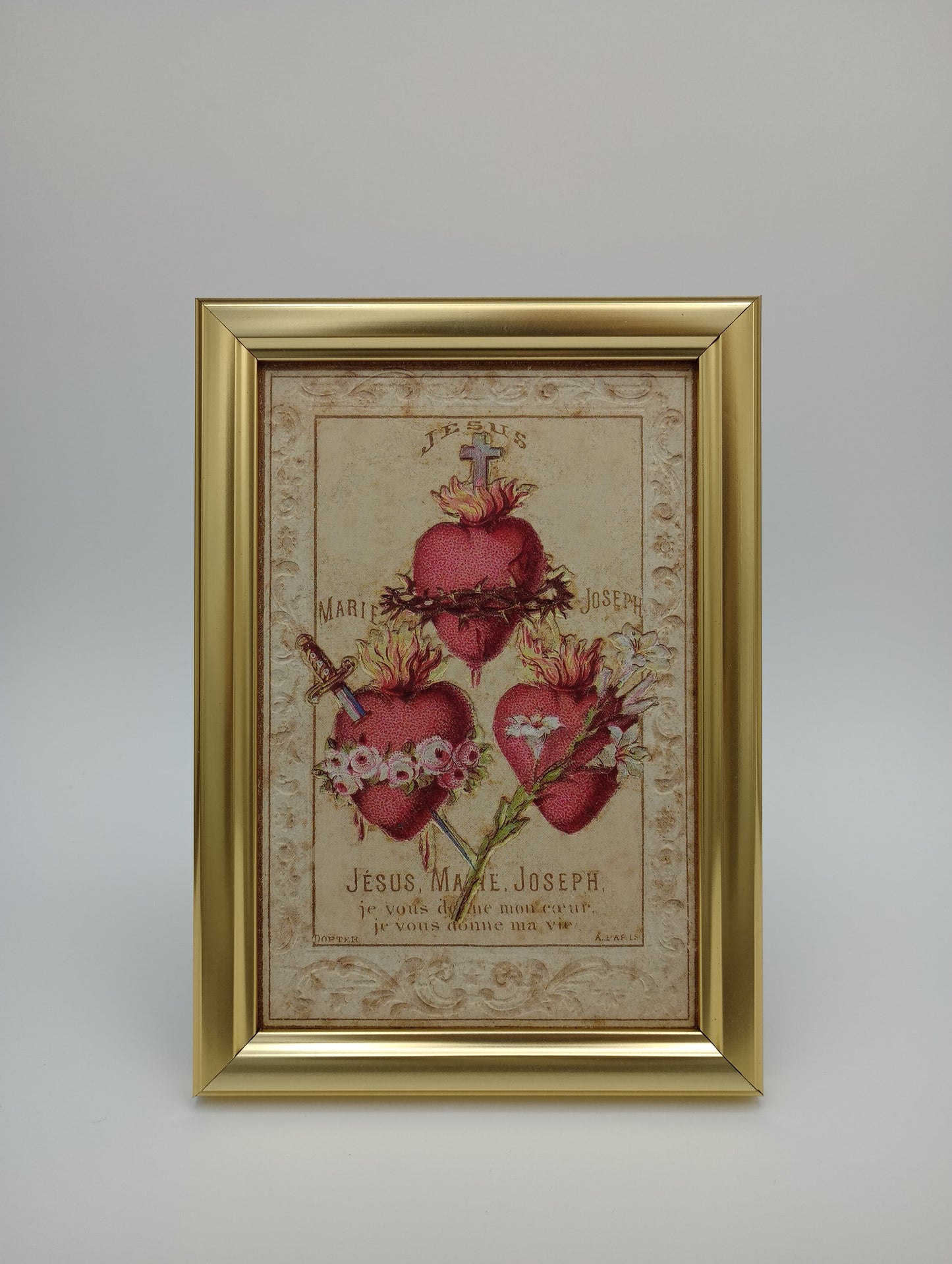 a picture of some flowers hanging on a wall