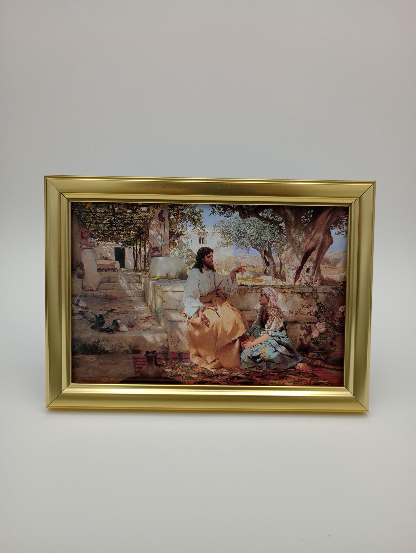 a painting hanging on the wall of a room