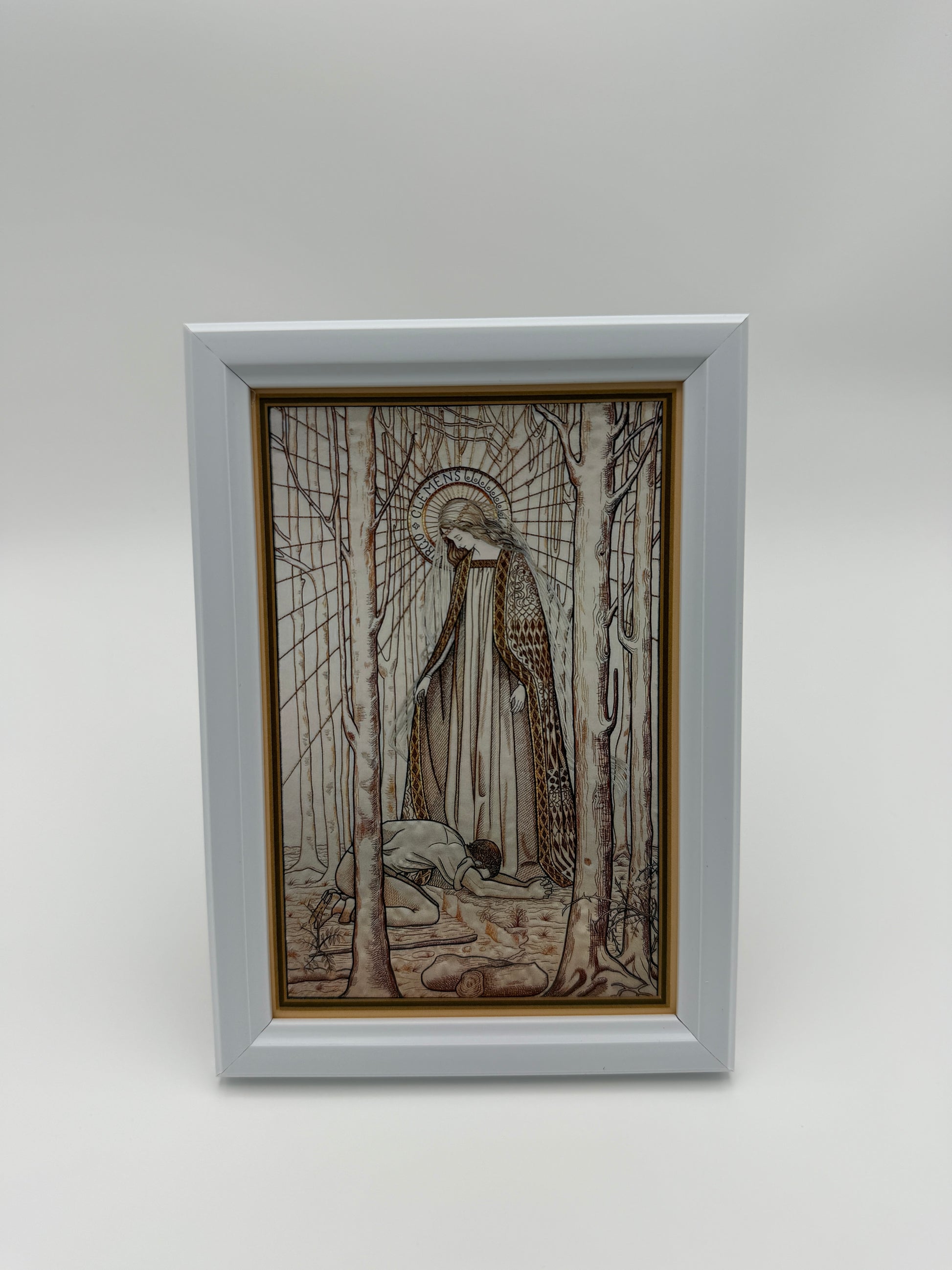 The image is a framed artwork depicting a person sitting in a chair, surrounded by a complex, intricate design.
