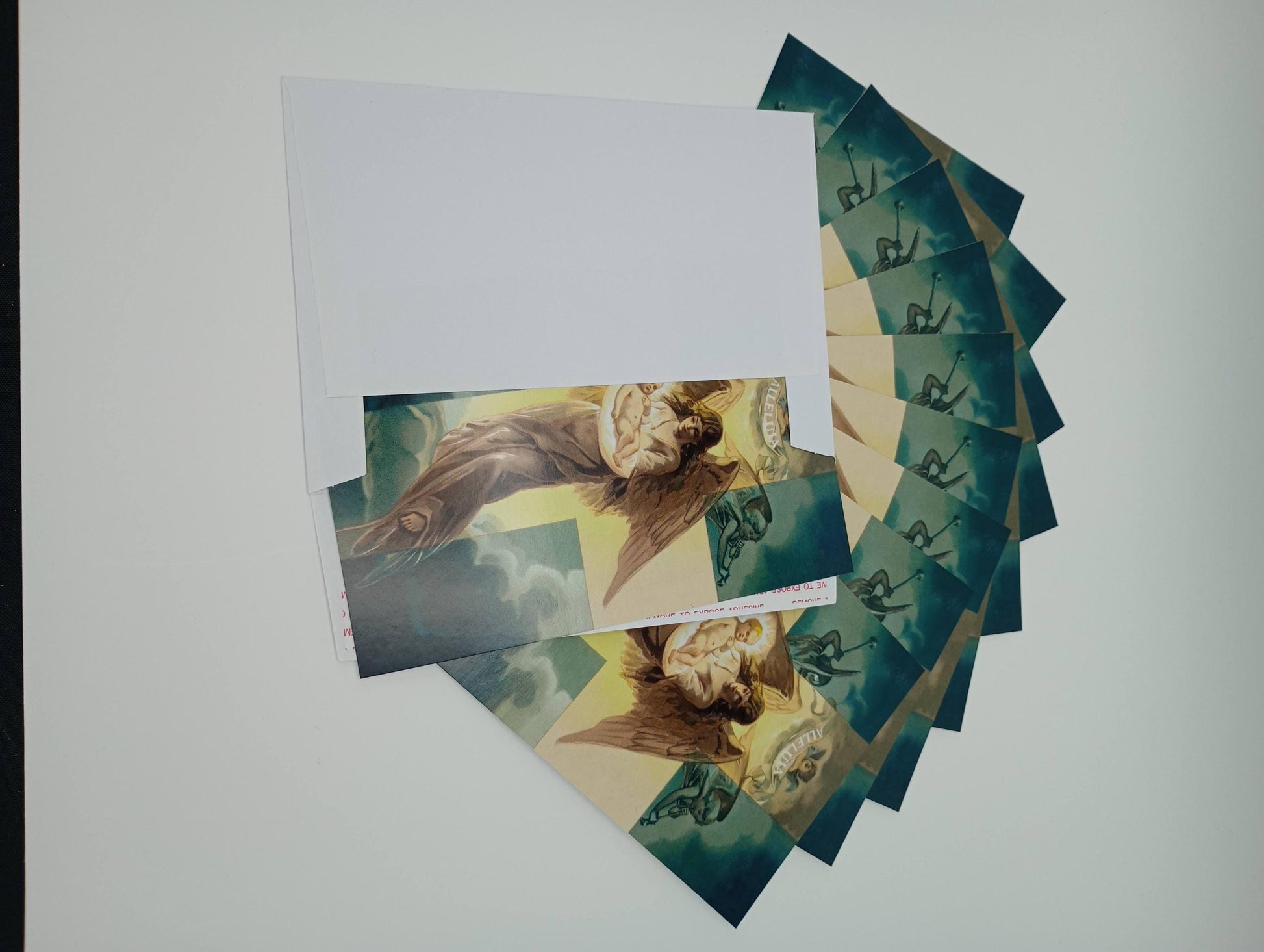 a bunch of cards with pictures of angels on them