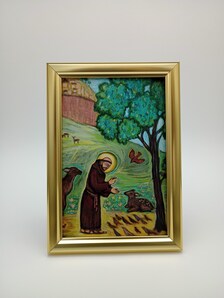 The image is a framed painting depicting a man in a brown robe, surrounded by animals and a tree, with a religious or pastoral theme.