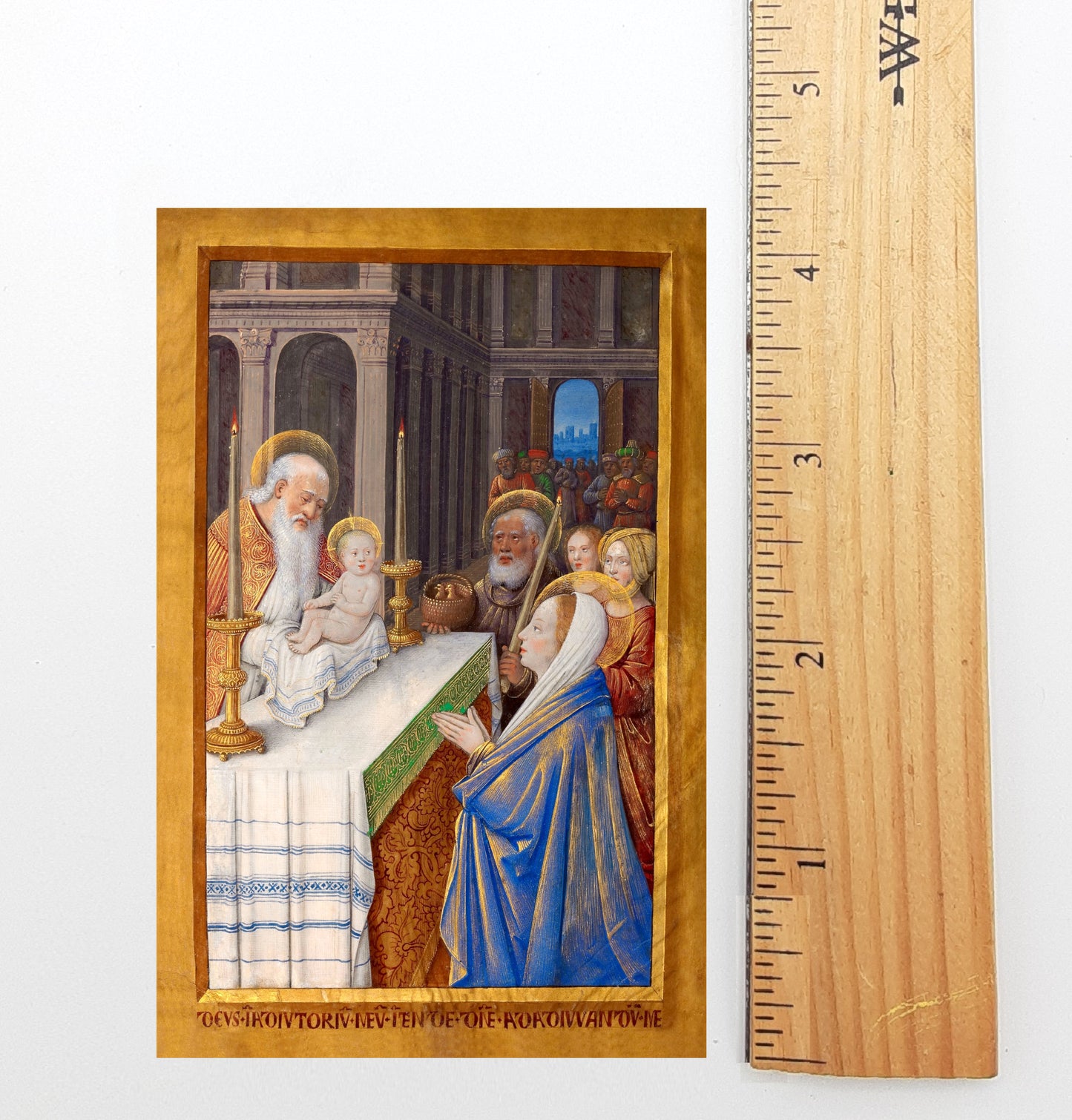 The image is a framed painting depicting a religious scene with a baby, a man, and a woman, all dressed in robes and surrounded by other figures.