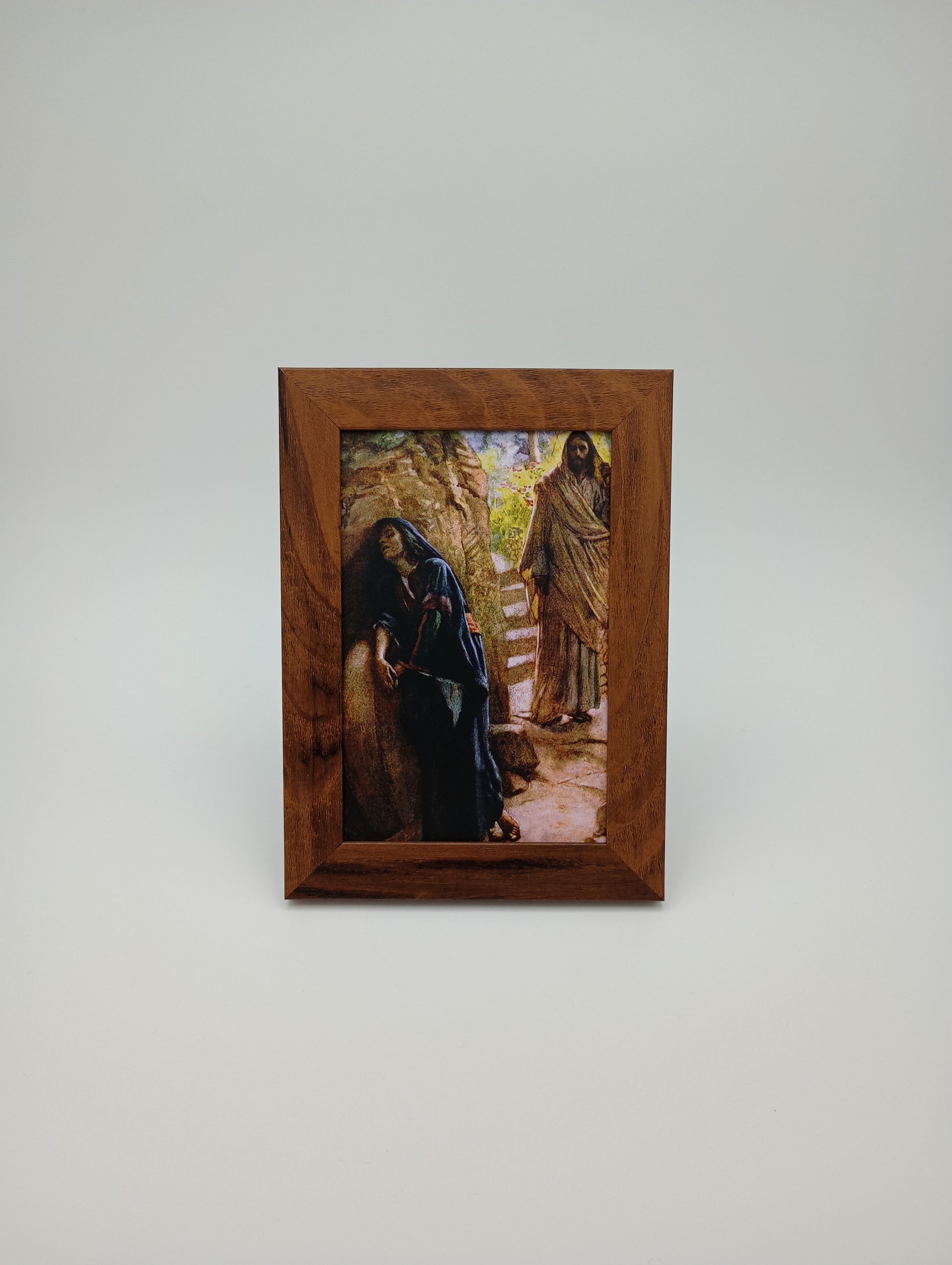 a picture of a cow in a wood frame