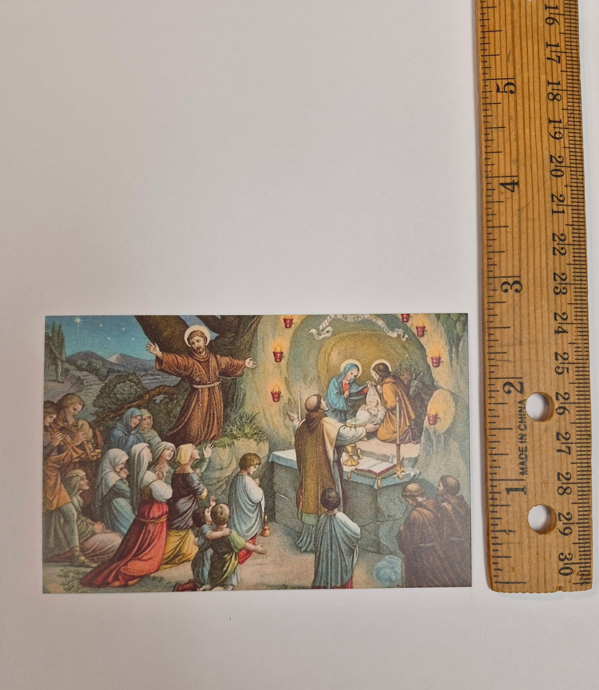 a picture of a painting on a wall next to a ruler