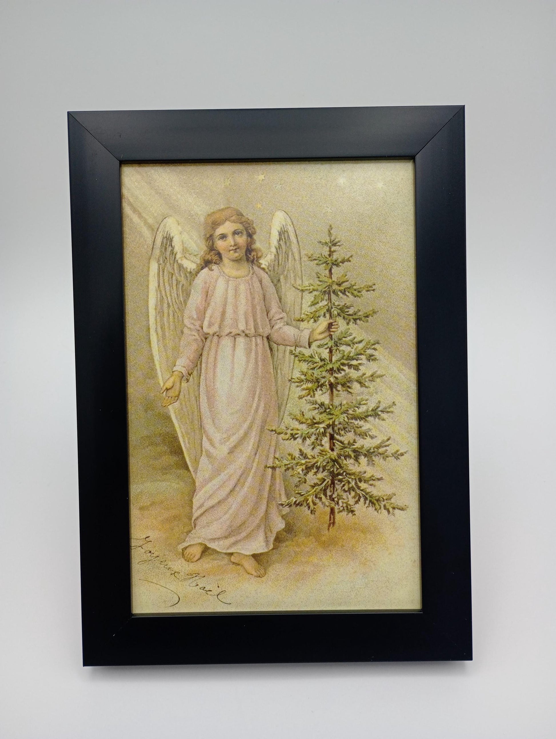 a painting of an angel holding a christmas tree