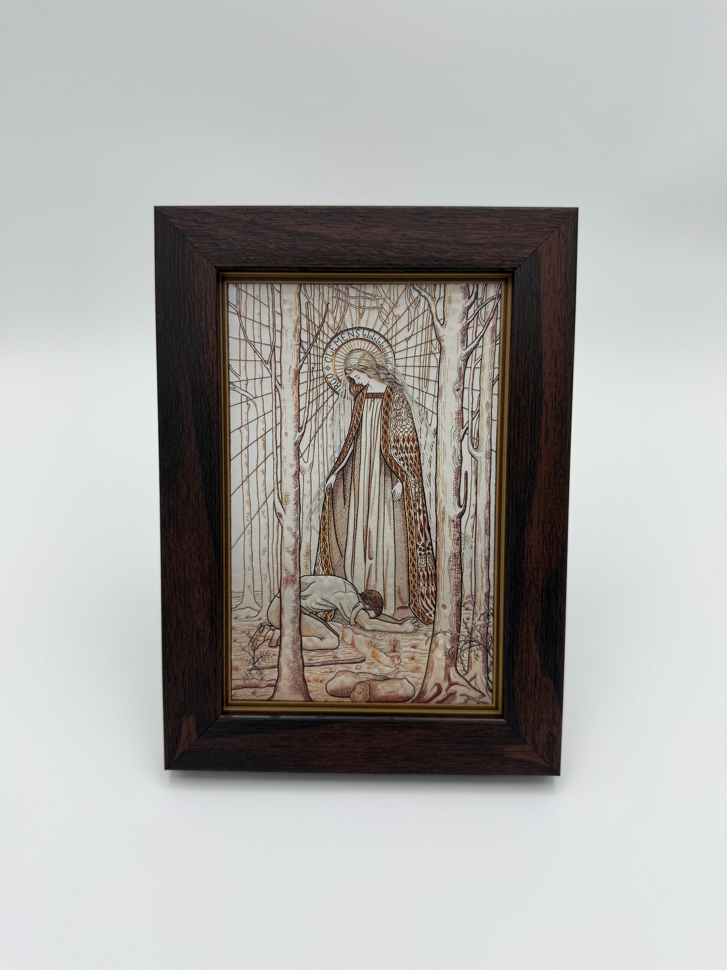 The image is a framed artwork depicting a person sitting in a chair, with a bird perched on their shoulder.