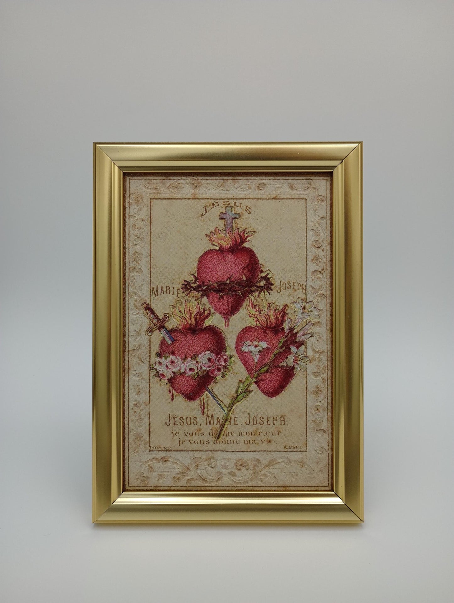 a picture of some flowers hanging on a wall