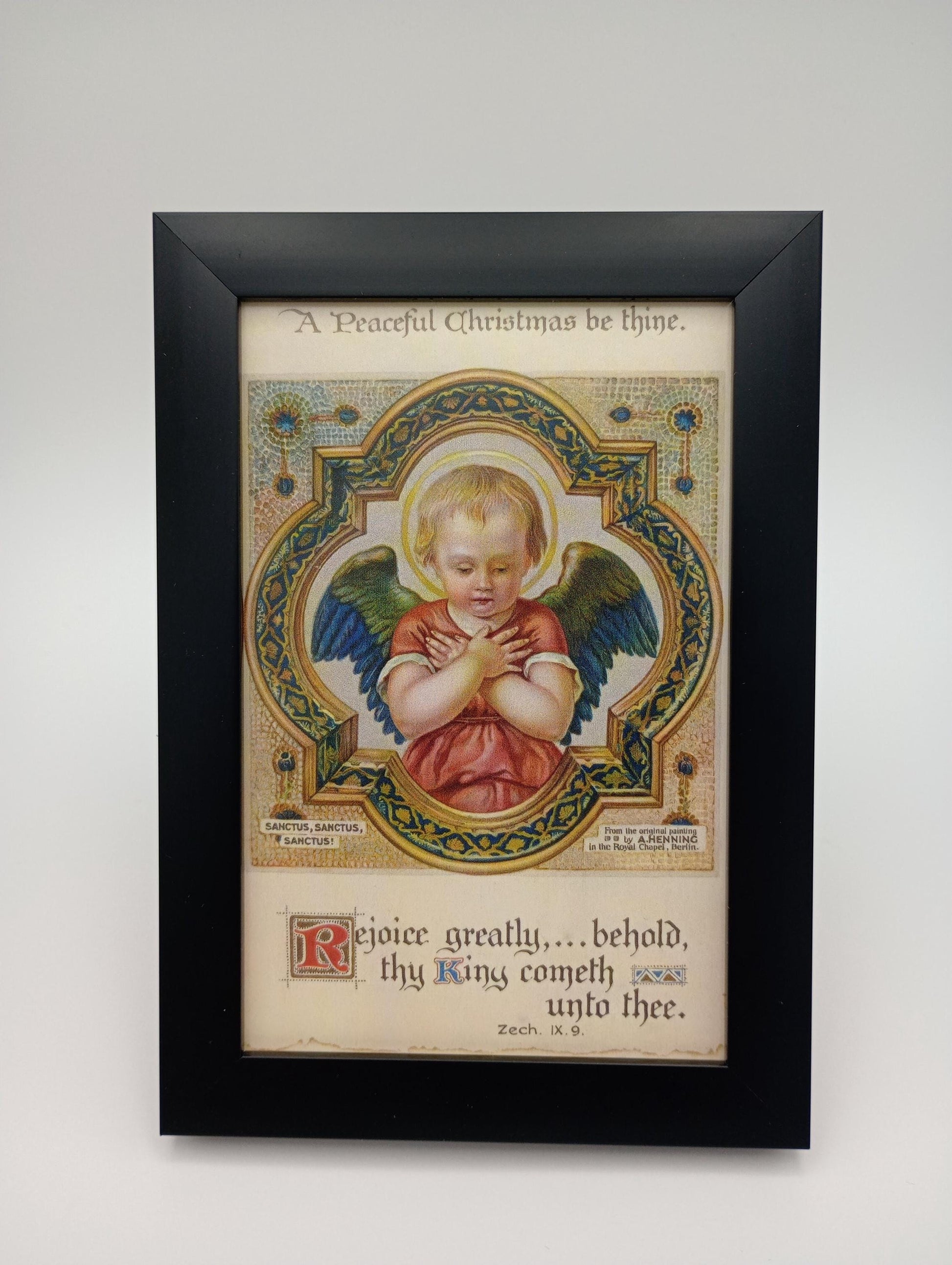 a picture of an angel holding a dove