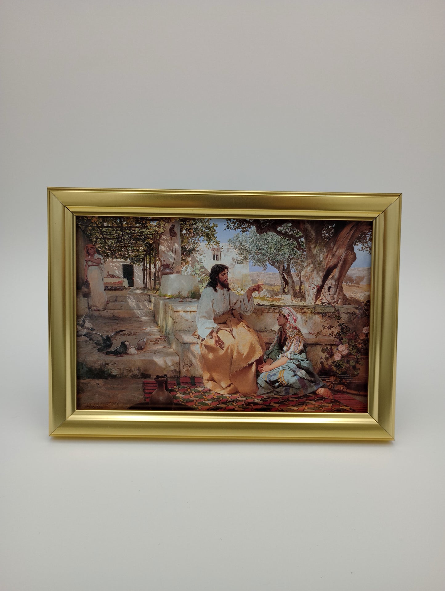 a painting hanging on the wall of a room