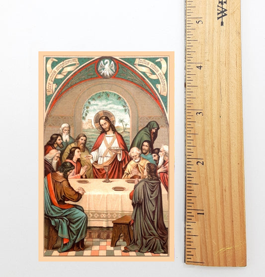 The image is a religious painting depicting Jesus Christ surrounded by his twelve apostles, with a large table in the center where they are gathered for a meal.