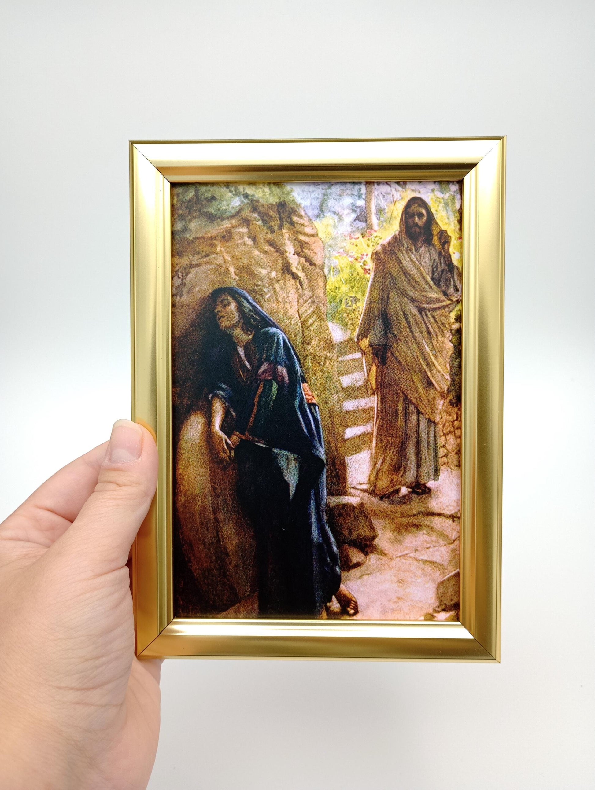 a person holding a picture of a bear in their hand